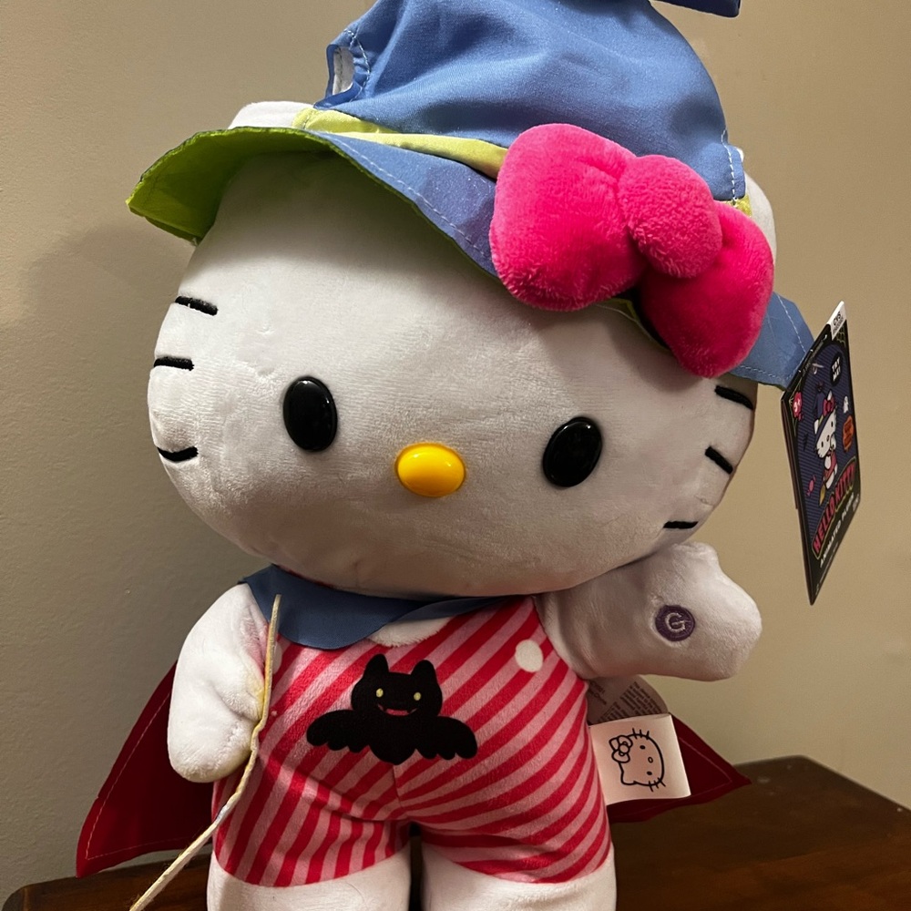 Hello Kitty Witch Halloween Greeter Sidestepper Dances Music